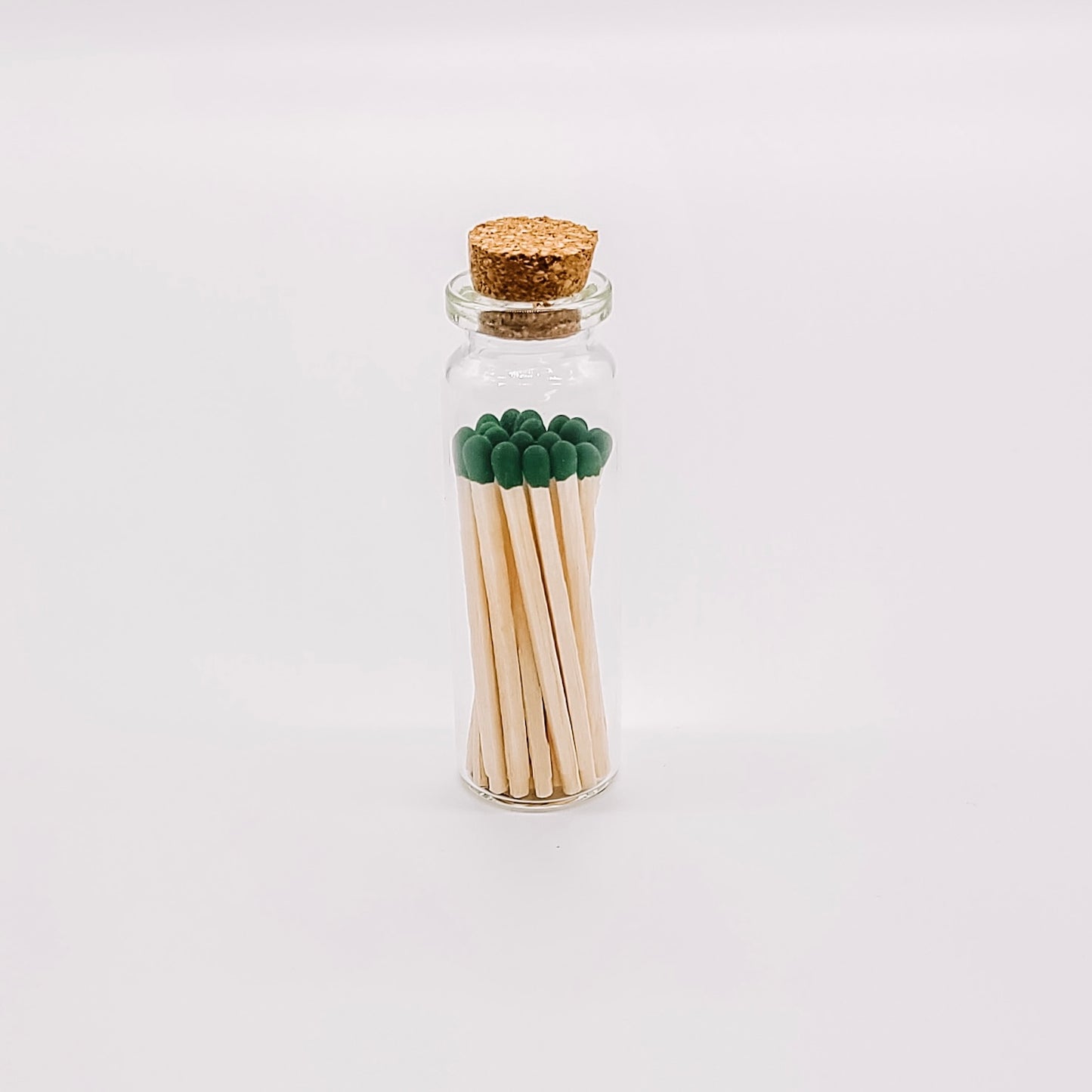 Dark Green Matches in Small Corked Vial